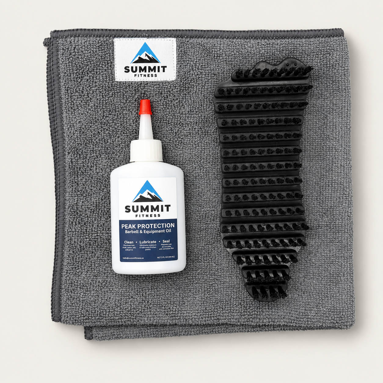 Nylon brush, Peak Protection oil and gray Summit Fitness microfiber towel